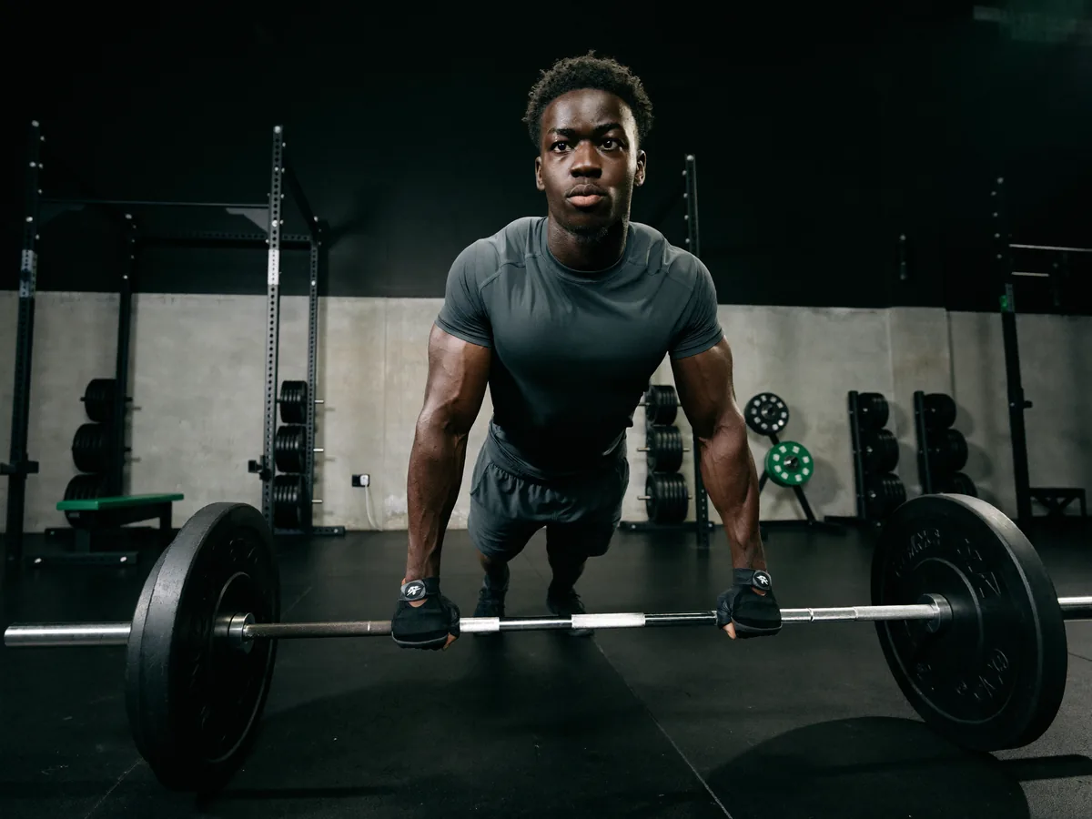 Athlete performing a barbell bench press