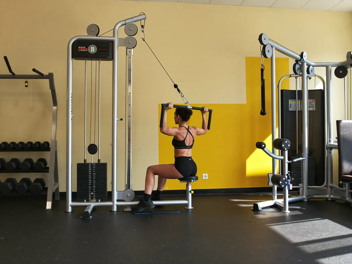 Athlete performing a lat pulldown